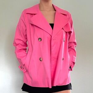 Bold and playful bright pink trench coat